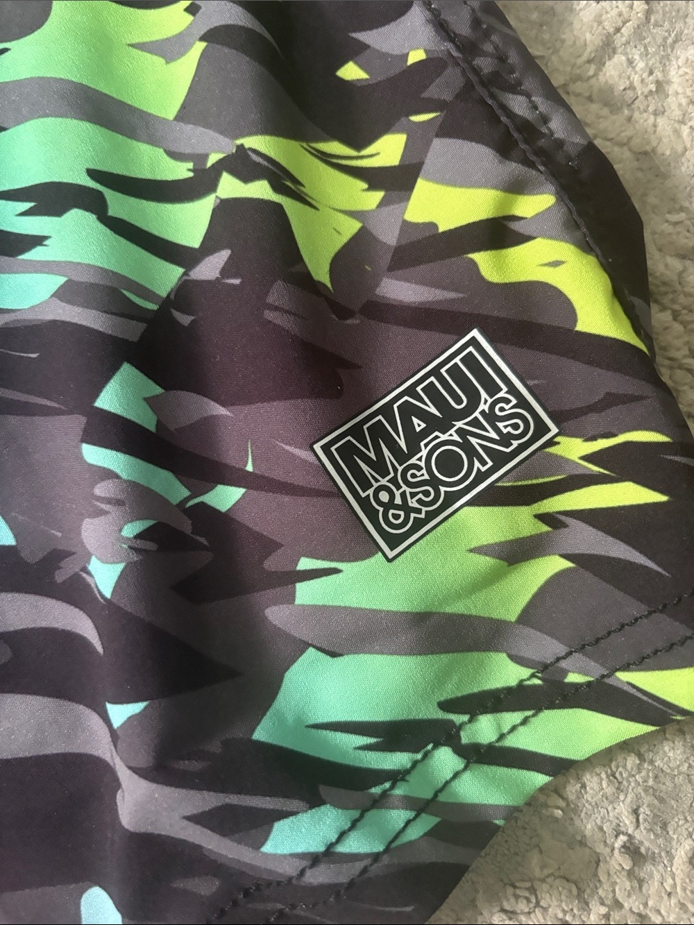 Maui and Sons Black Swim Shorts with Pink, Green & Aqua Graphic - Picture 2 of 5